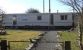 Picture of static caravan with enclosed garden.